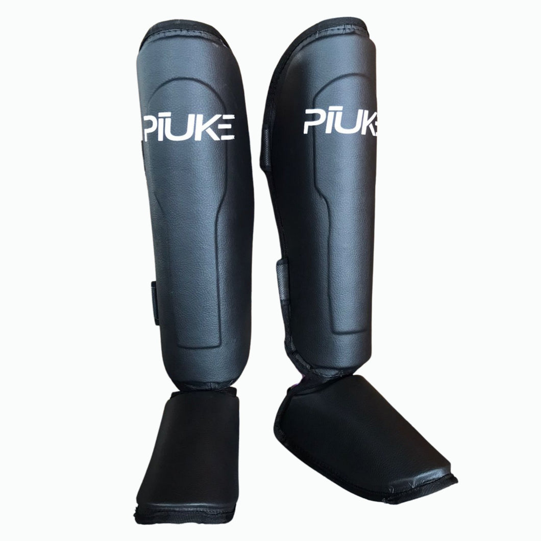 PROTECTOR TIBIAL PIUKE ADULTO 32202